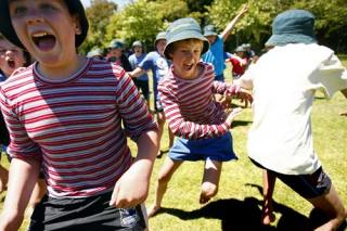 Kids playing "Bullrush" in New Zealand.  It's like rugby without a ball.