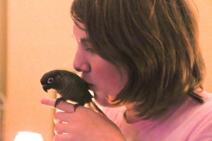 Thryn with Parie, her bird.
