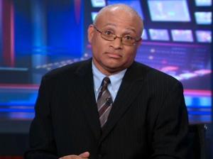 Larry Wilmore's classic "What did you expect?" look.  The real face of Black America, 100%.